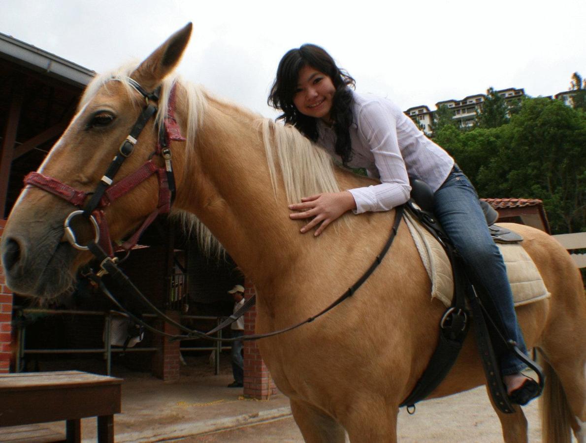 The Chateau Spa & Wellness Resort Bukit Tinggi Exterior photo A woman riding a horse
